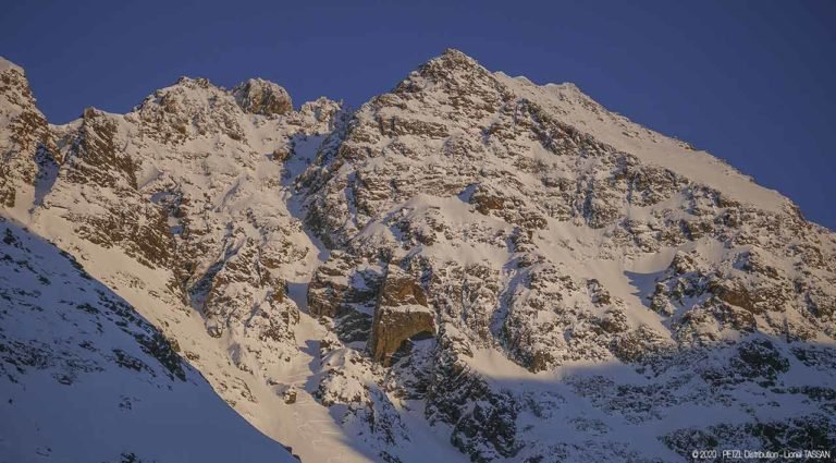COULOIR SKIING AT SUNSET